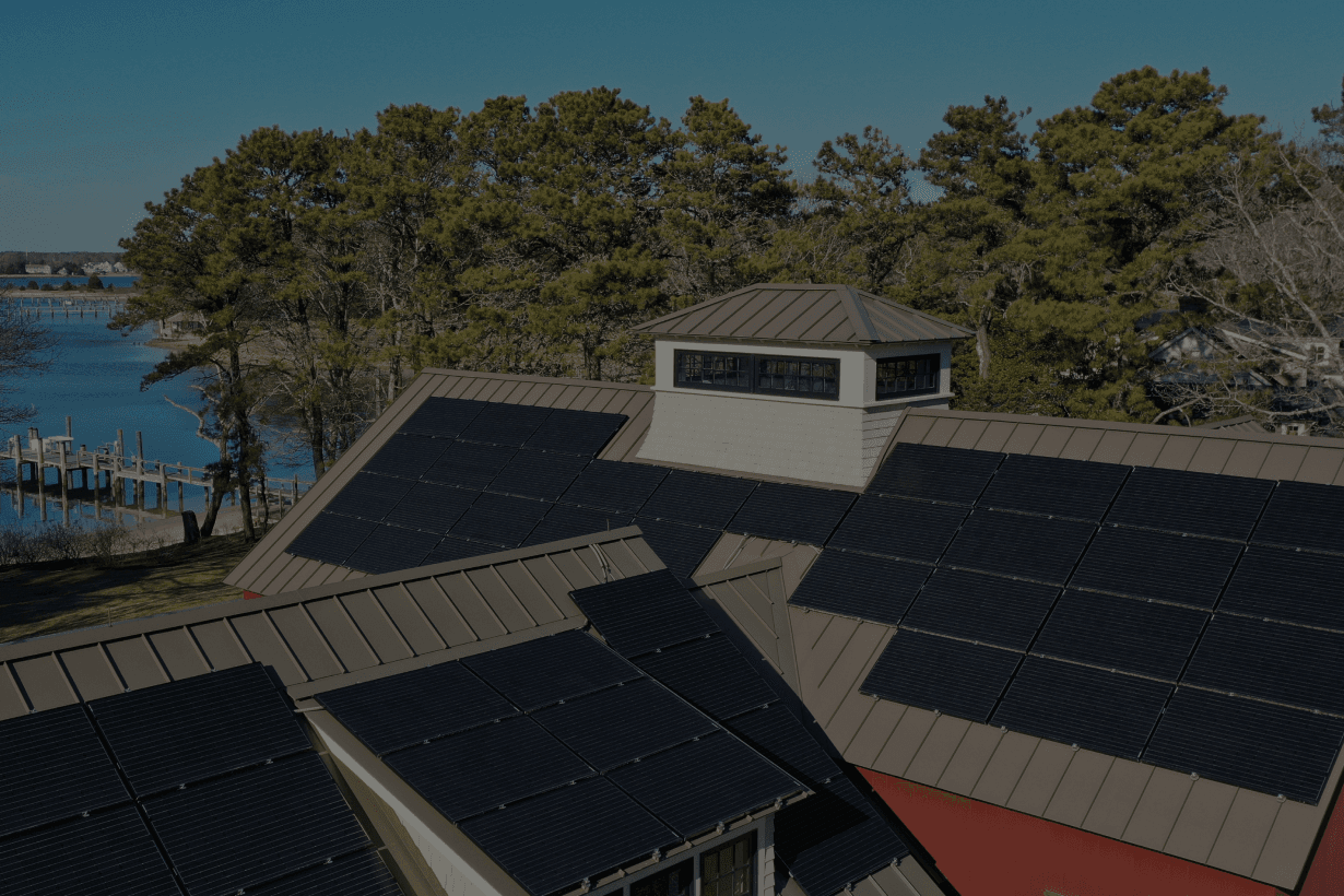 Solar Panels on Roofs of A Vermont Home Overlooking Champlain Lake