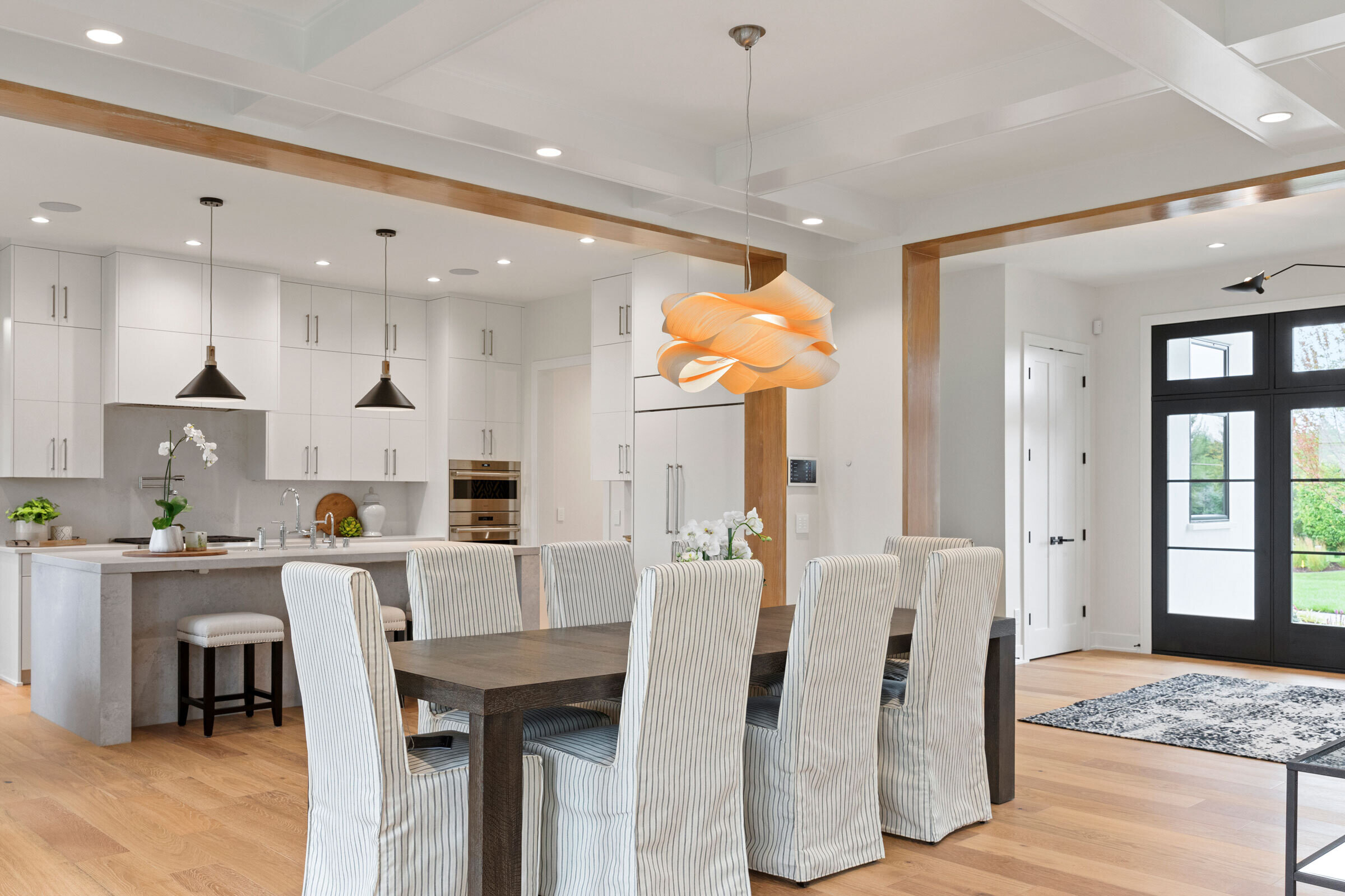 Dimming Wells in Grey Toned Elegant Dining Room & Kitchen