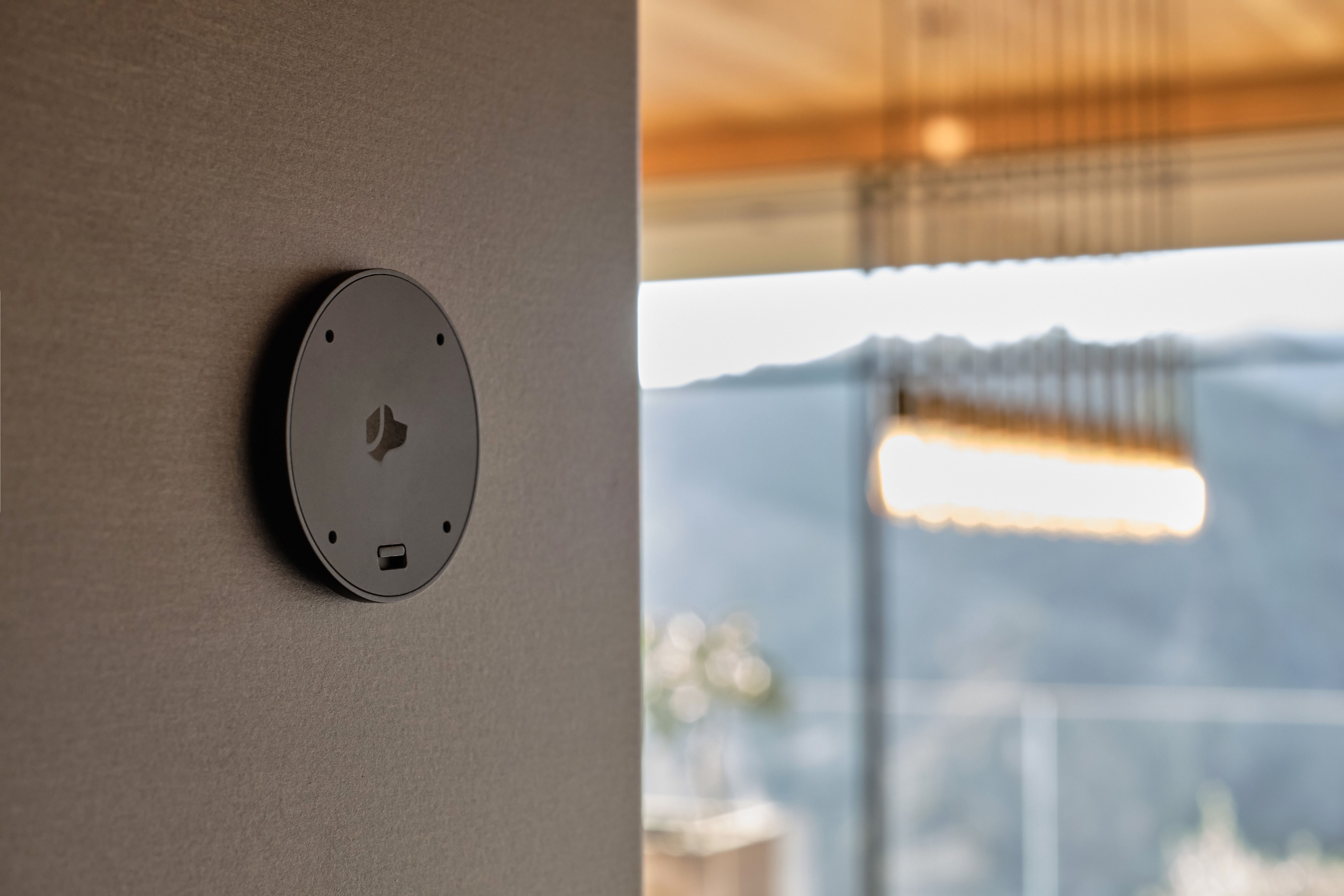 Smart Home Security Device Wall Mounted in Upscale Living Space