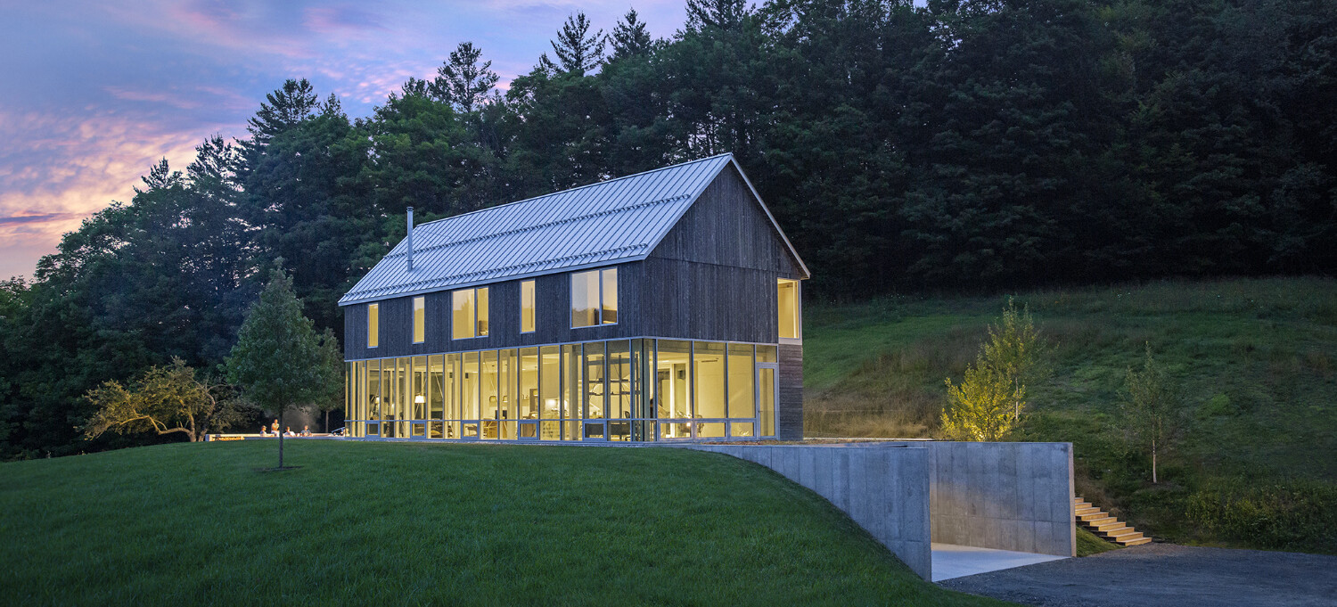 Architectural Lighting 2-Level Home With Ceiling to Floor Glass Windows