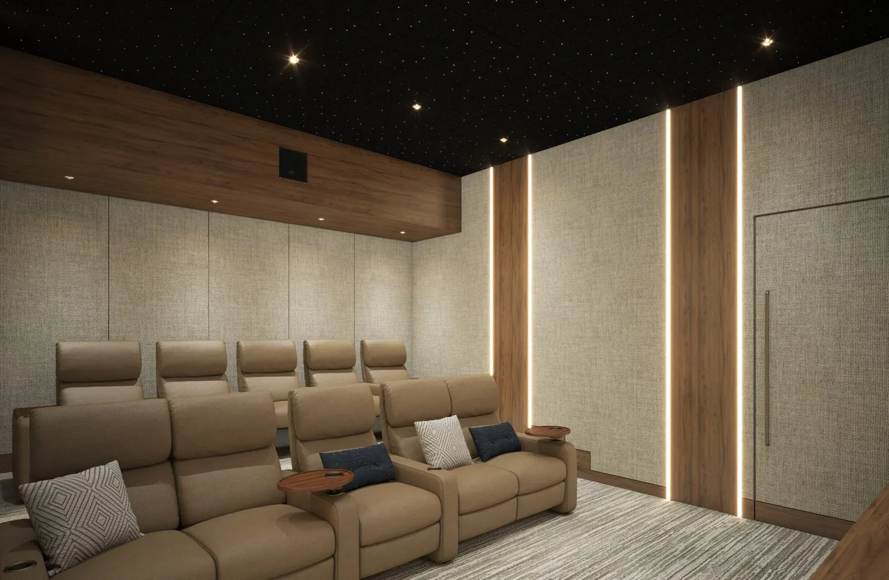 A row of leather recliners in a theater with fabric walls and lit wood strips