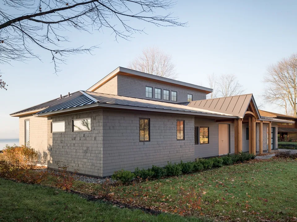The Burlington lake house in low late-day sun